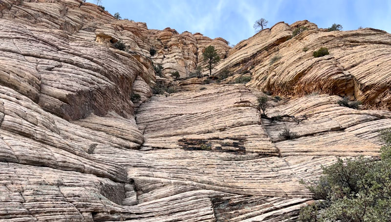 Downclimb after rappel one in Grizzly Canyon