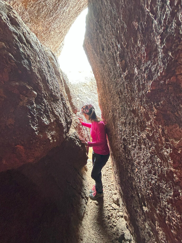 Going underneath Submarine Rock in the McDowell Sonoran Preserve