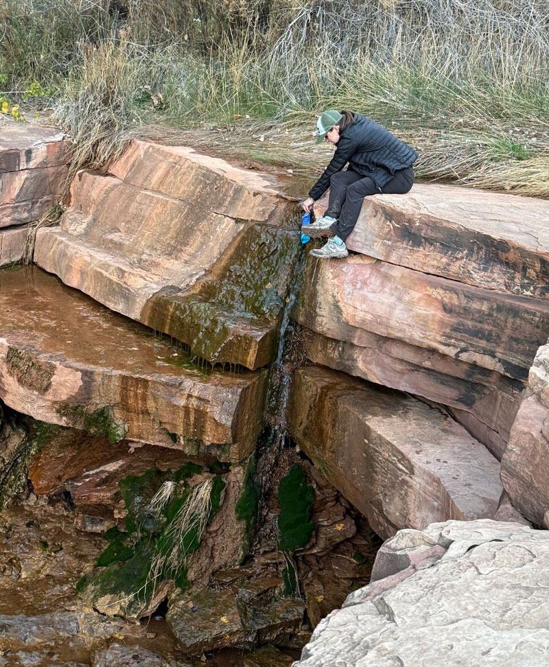 Getting water at Upper Jump spring in Canyonlands National Park
